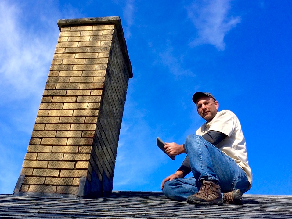 John Lawson of Assured Home Inspections inspecting the roof of a single-family home in Northern Kentucky - Northern Kentucky Home Inspection Services We perform home inspections in the entire Greater Cincinnati and Northern Kentucky area. Contact us today to see how we can help!